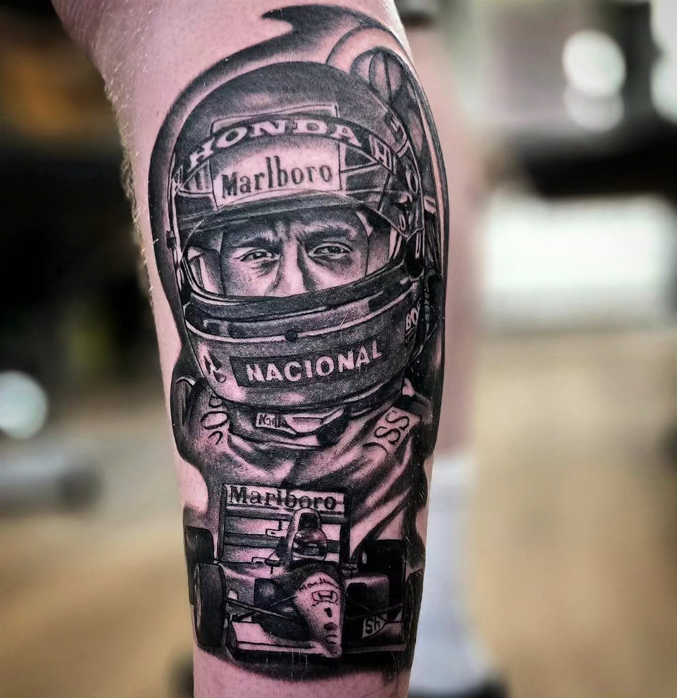 Racing driver helmet portrait tattoo